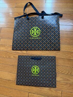 Tory Burch paper bag with Neon Green Logo and Orange Geometric Print